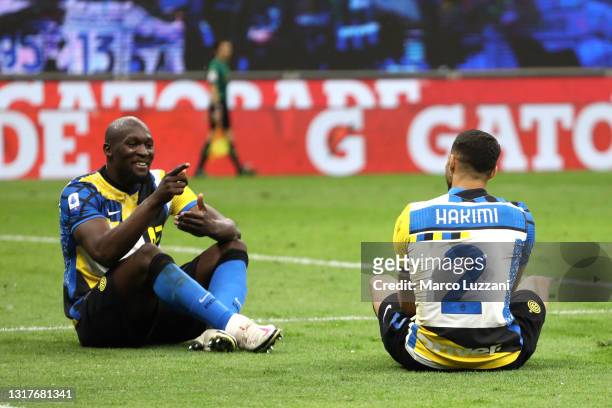 Romelu Lukaku of FC Internazionale celebrates after scoring their sides third goal with team mate Achraf Hakimi during the Serie A match between FC...