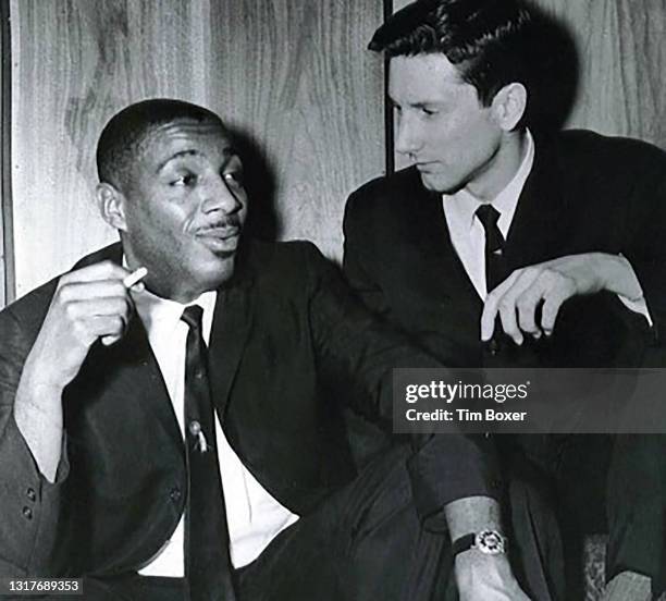 Comedian and activist Dick Gregory and photographer Tim Boxer at the Playboy Club in 1961 in Chicago, Illinois.