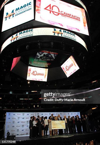 Dr. David Ho, Cookie Johnson, Earvin "Magic" Johnson, Chris Riley, Pat Riley and Jerry Buss attend 20th Anniversary of Magic Johnson's Retirement and...