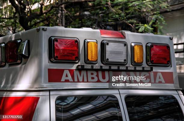 rear view of an ambulance parked in a street in mexico city - ambulance bildbanksfoton och bilder