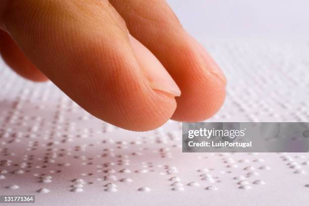 braille reading - braille stock pictures, royalty-free photos & images