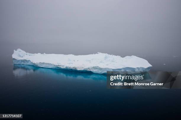iceberg in antarctica - ice floe stock pictures, royalty-free photos & images