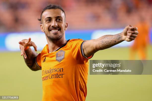 Maximiliano Urruti of Houston Dynamo celebrates his goal in the 56th minute against the Sporting Kansas City at BBVA Stadium on May 12, 2021 in...