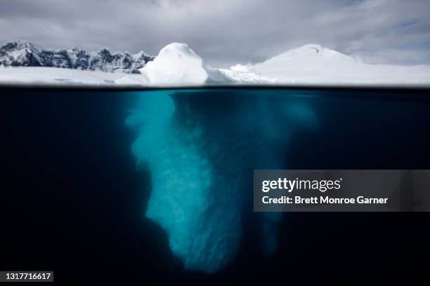 iceberg in antarctica underwater - antarctica boat stock pictures, royalty-free photos & images