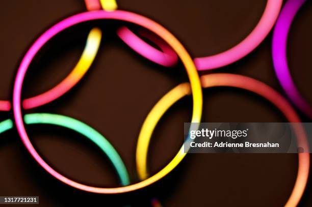 rainbow rings - illuminated ring stock pictures, royalty-free photos & images