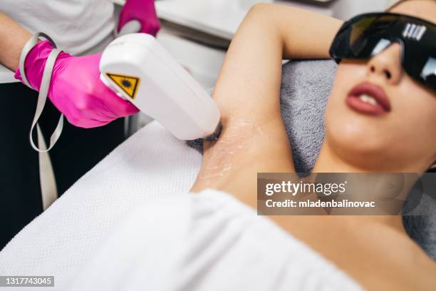 body care. laser hair removal. epilation treatment. smooth skin. - electrolysis stock pictures, royalty-free photos & images