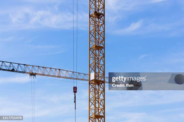 cranes at a construction site - right angle stock pictures, royalty-free photos & images