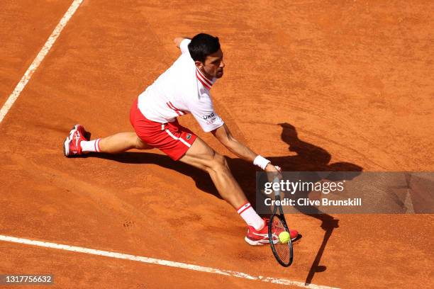 Novak Djokovic of Serbia plays a forehand in their men's singles third round match against Davidovich Fokina of Spain during Day Six of the...