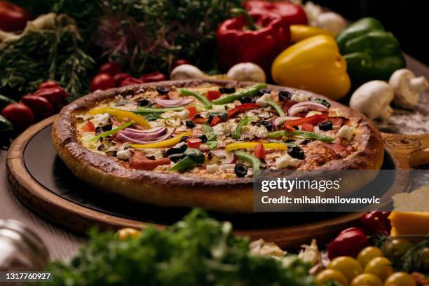 letting it cool off a bit before digging in - deep dish pizza stock pictures, royalty-free photos & images