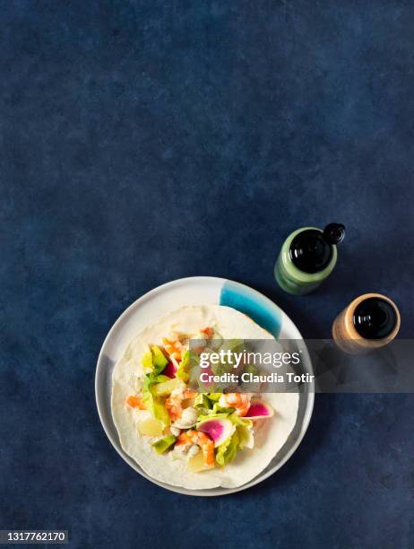 Shrimp Tostada On Blue Background High-Res Stock Photo