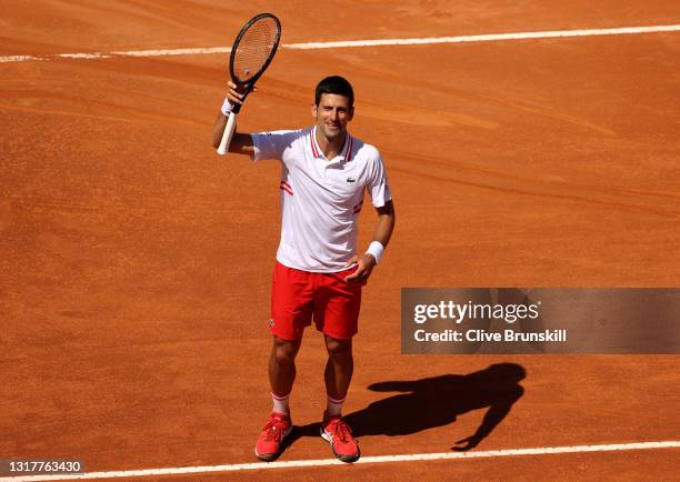 Novak Djokovic of Serbia celebrates victory in their men's singles third round match against Davidovich Fokina of Spain during Day Six of the...