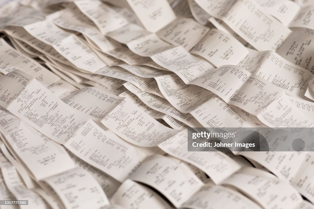 High angle view of various receipts