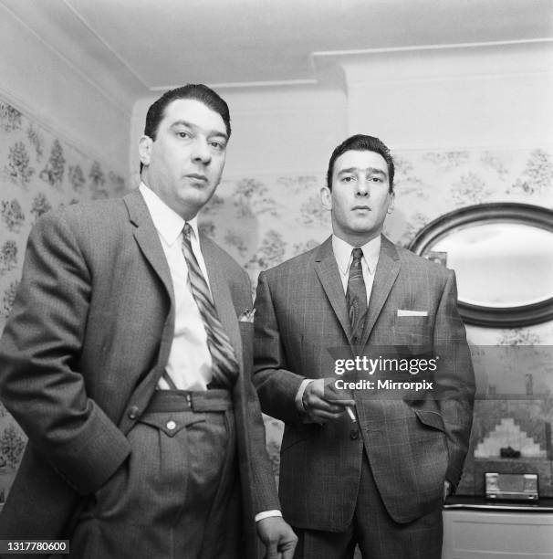 The Kray Twins, Ronald and Reginald, seen here at home after helping police with their inquiries into a shooting at the Blind Beggar Pub, London, UK,...