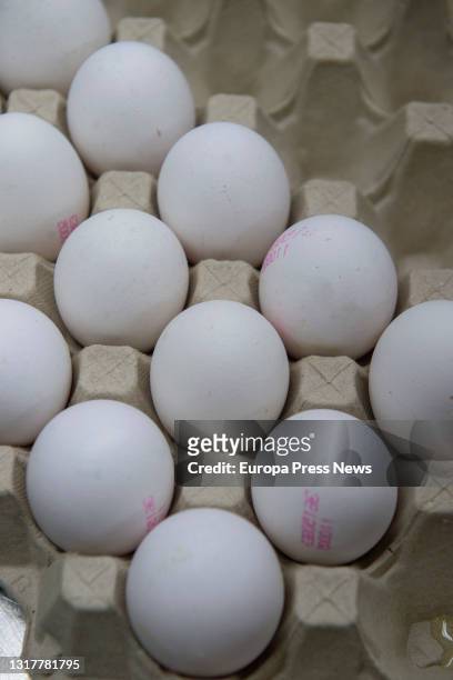 Eggs for the dough of the typical donuts of San Isidro just out of the oven, in Casa Mira, on May 13, 2021 in Madrid, Spain. The different types of...