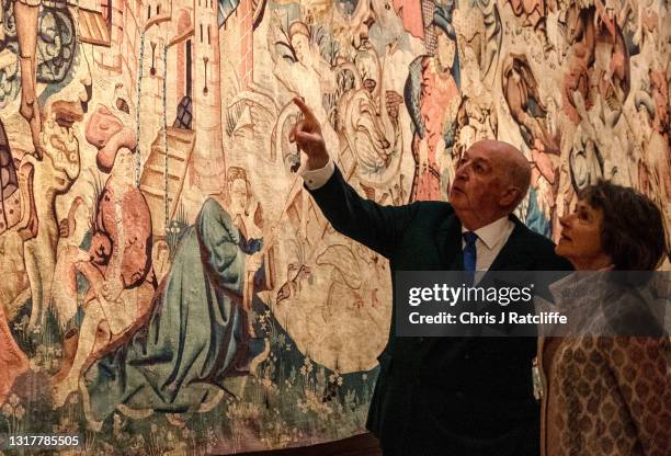 The Duke and Duchess of Devonshire look at the Devonshire Hunting Tapestries at their home, Chatsworth House on May 13, 2021 in Bakewell, England....