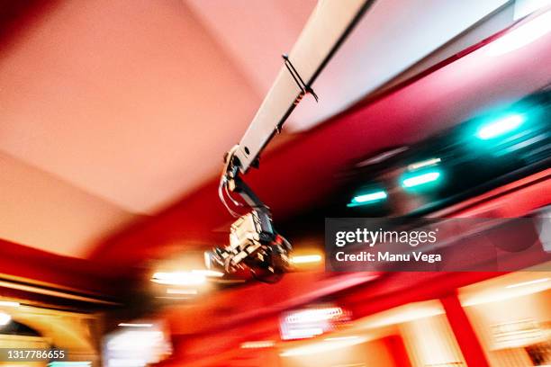 camera on a crane in motion in a tv studio - film set lighting stock pictures, royalty-free photos & images