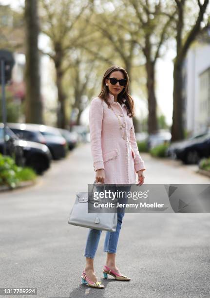 Alexandra Lapp wearing light pink Chanel tweed jacket, light grey Hermès Birkin leather bag and Chanel jewellery, all via SuperBrands secondhand...