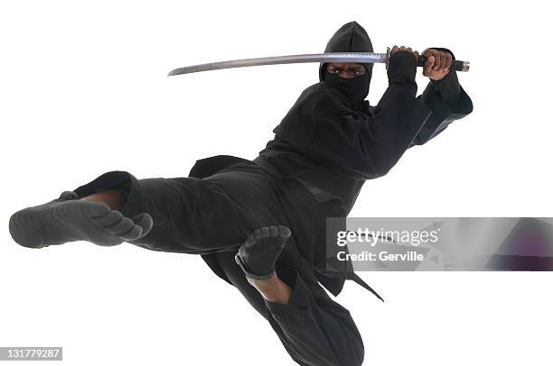 flying ninja - ninja sword stock pictures, royalty-free photos & images