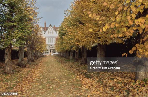 Tree-lined path leading to an unspecified building at Ludgrove School, an independent preparatory boarding school in Wokingham, Berkshire, England,...