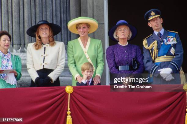 British Royals Princess Margaret, Countess of Snowdon , Sarah, Duchess of York, Diana, Princess of Wales, wearing a green dress with yellow trim and...