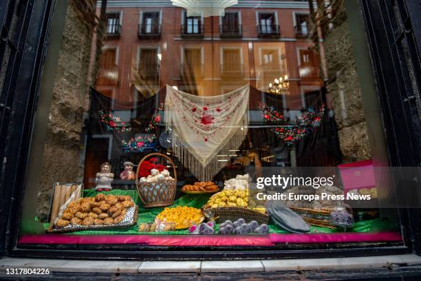 Rosquillas de Santa Clara, lemon and francesas and tontas de San Isidro exposed in the window of the Horno de San Onofre, on 13 May, 2021 in Madrid,...