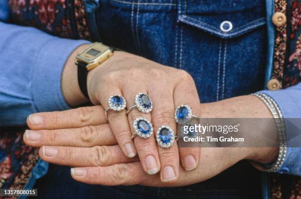 An unspecified woman wearing replicas of Princess Diana's engagement ring, in the village of Tetbury, Gloucestershire, England, 14th July 1986....