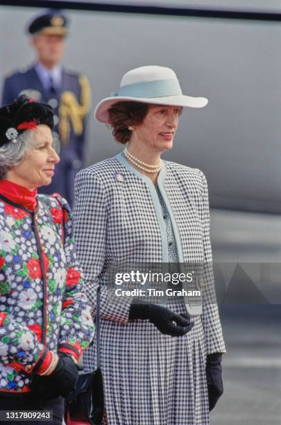 Lady of the Bedchamber Virginia Ogilvy, Countess of Airlie, and Woman of the Bedchamber to Queen Elizabeth II Lady Susan Hussey as Queen Elizabeth II...