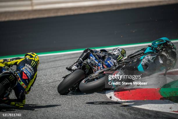 Franco Morbidelli's bike flies between Valentino Rossi and Maverick Viñales after a crash at turn 3 at Red Bull Ring on August 16, 2020 in Spielberg,...