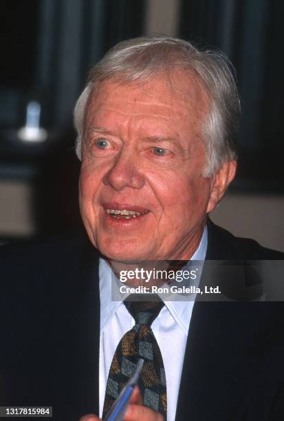 Jimmy Carter attends "The Little Baby Snoogle-Fleejer" Book Party at Barnes and Noble in New York City on December 13, 1995.