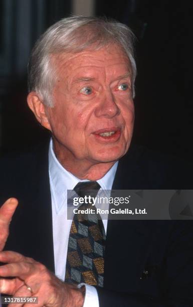 Jimmy Carter attends "The Little Baby Snoogle-Fleejer" Book Party at Barnes and Noble in New York City on December 13, 1995.