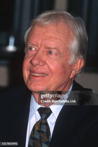 Jimmy Carter attends "The Little Baby Snoogle-Fleejer" Book Party at Barnes and Noble in New York City on December 13, 1995.