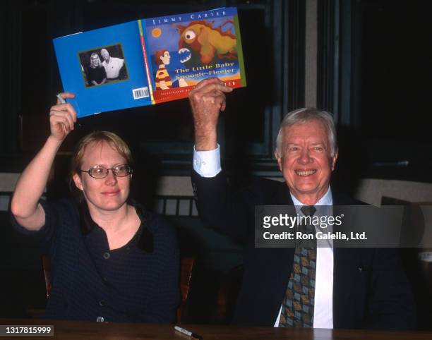 Amy Carter and Jimmy Carter attend "The Little Baby Snoogle-Fleejer" Book Party at Barnes and Noble in New York City on December 13, 1995.