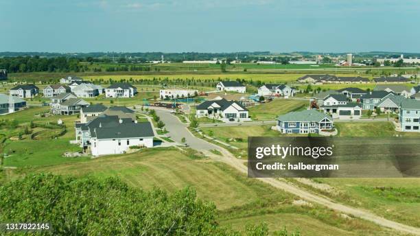 newly built suburban homes in wisconsin - drone shot - wisconsin house stock pictures, royalty-free photos & images