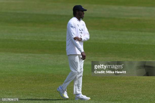 Jofra Archer of Sussex feels his right elbow during the LV= Insurance County Championship match between Sussex and Kent at The 1st Central County...