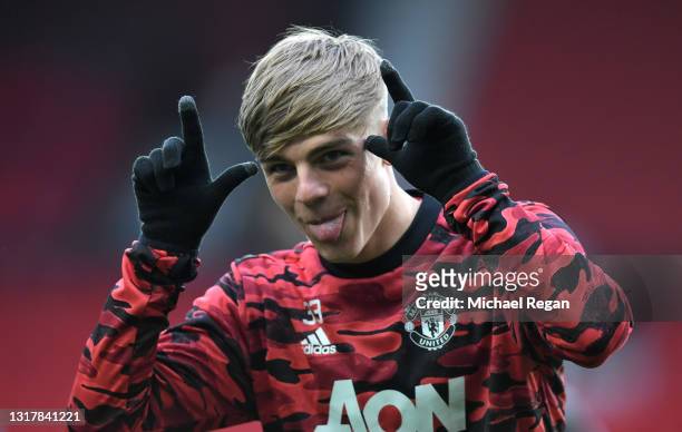 Brandon WIlliams of Manchester United reacts as he warms up prior to the Premier League match between Manchester United and Liverpool at Old Trafford...