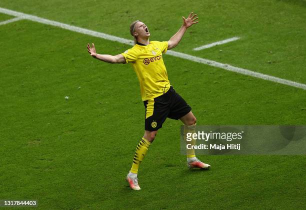 Erling Haaland of Borussia Dortmund celebrates his team's second goal during the DFB Cup final match between RB Leipzig and Borussia Dortmund at...