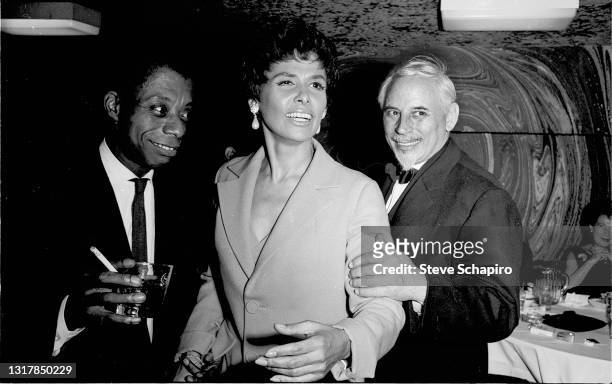 View of, from left, American Civil Rights activists author James Baldwin and married couple, actress & singer Lena Horne and conductor & composer...