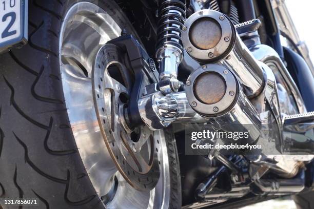 chromed exhaust system of a cruiser motorcycle - 4 wheel motorbike stock pictures, royalty-free photos & images
