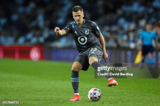 Robin Lod of Minnesota United dribbles the ball against the Vancouver Whitecaps in the second half of game at Allianz Field on May 12, 2021 in St...