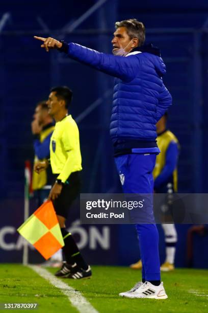 Mauricio Pellegrino head coach of Velez Sarsfield gives instructions to his players during a match between Velez and Liga Deportiva Universitaria as...