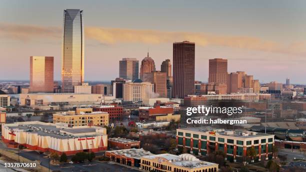 bricktown and central business district at sunrise in oklahoma city - aerial - v oklahoma stockfoto's en -beelden