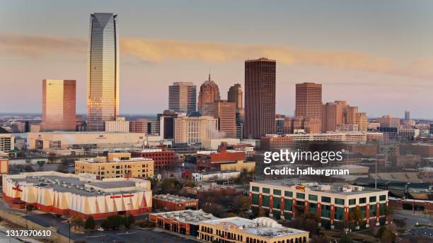 bricktown and central business district at sunrise in oklahoma city - aerial - oklahoma stock pictures, royalty-free photos & images