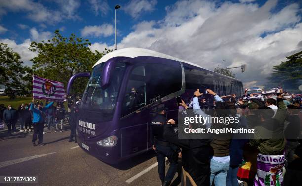 Fans of Real Valladolid welcome the team coach as it arrives at the stadium prior to the La Liga Santander match between Real Valladolid CF and...