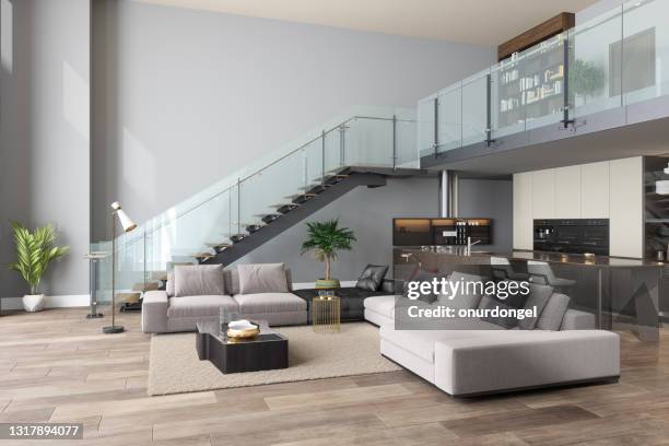 soggiorno di lusso con divano, cucina a pianta aperta e scala. - loft interior foto e immagini stock