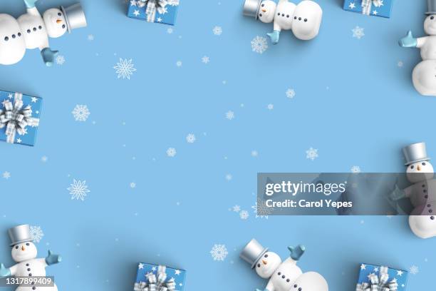 snowman and snowflakes  frame in blue.christmas composition - blue christmas background stock pictures, royalty-free photos & images