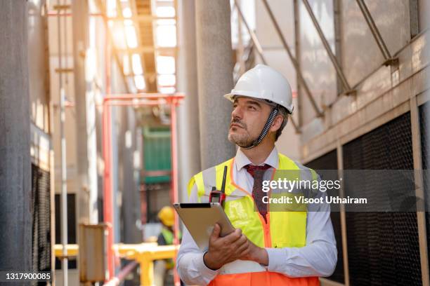 Construction Machine Inspection Construction Equipment Inspection Photos and Premium High Res Pictures ...