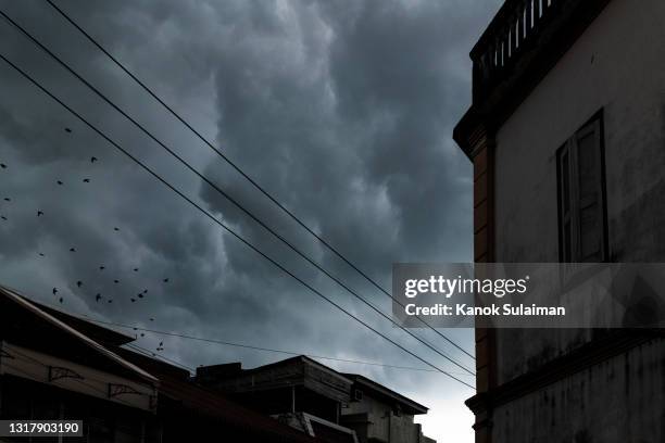 stormy day with old building - hot weather bildbanksfoton och bilder