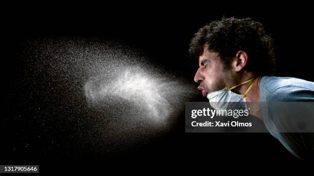 human sneeze without a mask - bogey stock pictures, royalty-free photos & images