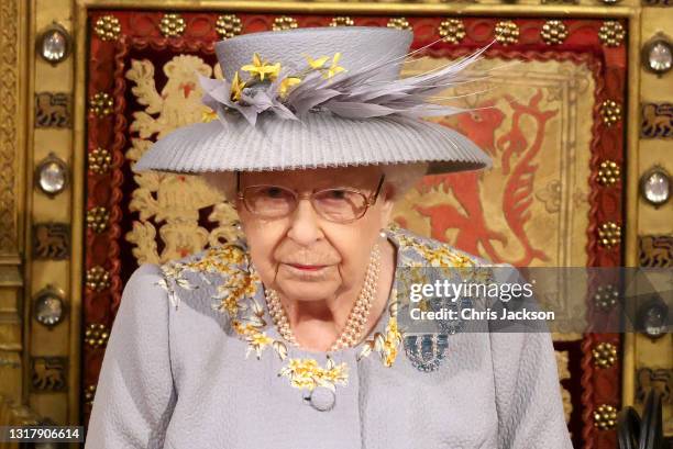 Queen Elizabeth II delivers the Queen's Speech in the House of Lord's Chamber during the State Opening of Parliament at the House of Lords on May 11,...