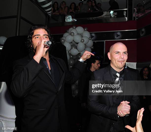 Jean CarlosCanela and Pitbull arrive at rapper Pitbull's 30th birthday celebration at Club Play on January 15, 2011 in Miami Beach, Florida.